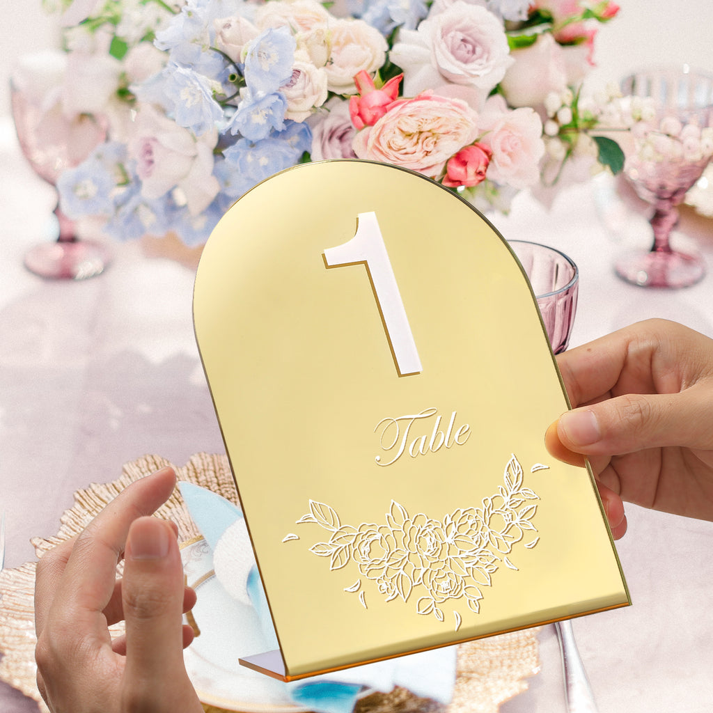 UNIQOOO Gold Mirror Wedding Table Numbers with Stands 1-15 set, 5x7'' Acrylic Arch Signs with Holders and Printed Calligraphy