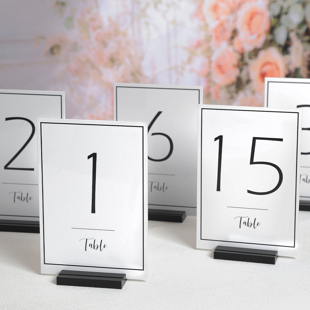 UNIQOOO White Wedding Table Numbers with Stands 1-15 set, 5x7'' Acrylic Signs with Holders and Printed Calligraphy