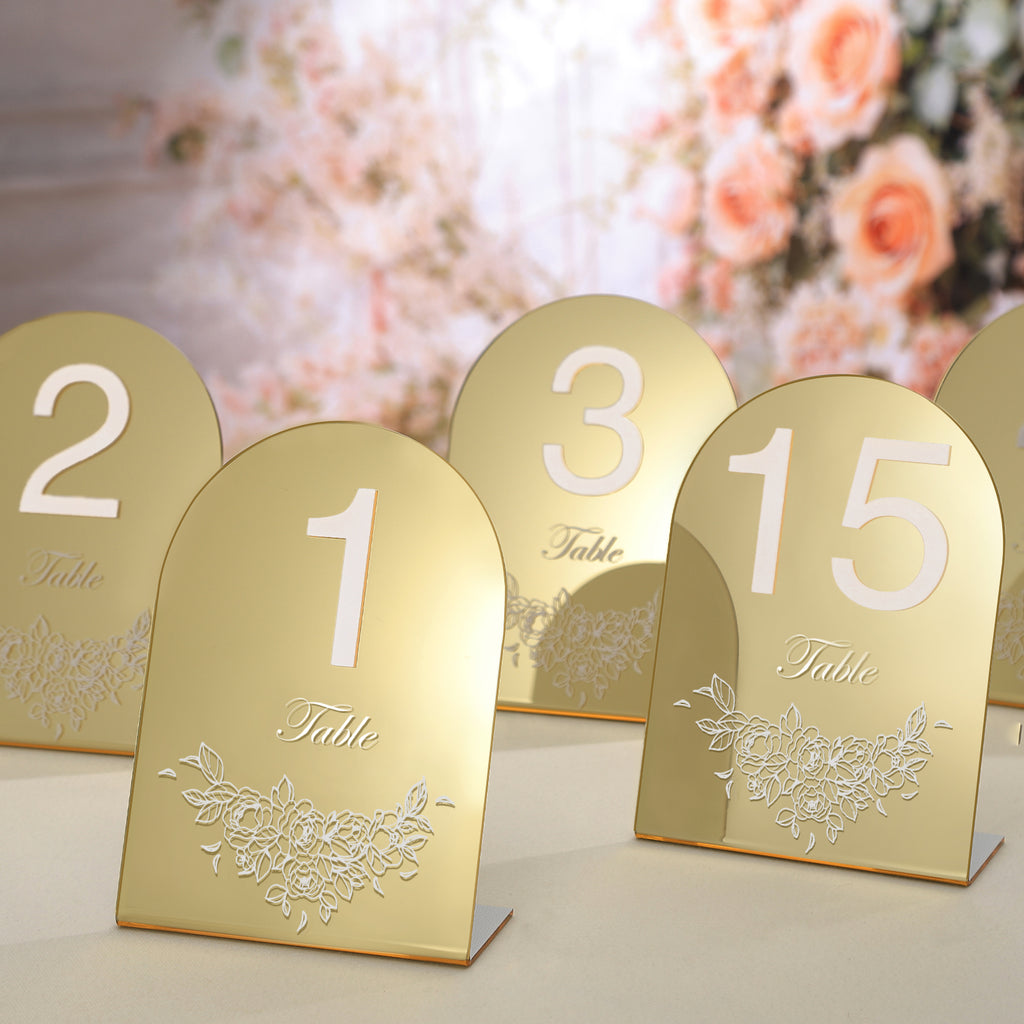 UNIQOOO Gold Mirror Wedding Table Numbers with Stands 1-15 set, 5x7'' Acrylic Arch Signs with Holders and Printed Calligraphy